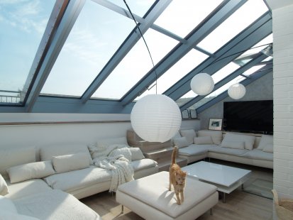 <translate>Attic roof windows in a family villa, vineyard house, and unique rooftop apartment</translate> - With the sliding glazing Solara PERSPEKTIV, maximum roof opening can be achieved.