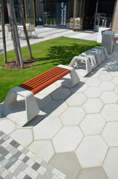 Unusual hexagonal paving H-E-X and urban furniture