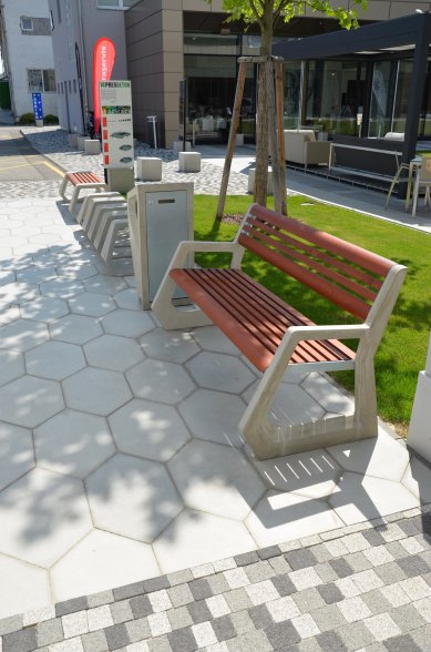 Unusual hexagonal paving H-E-X and urban furniture